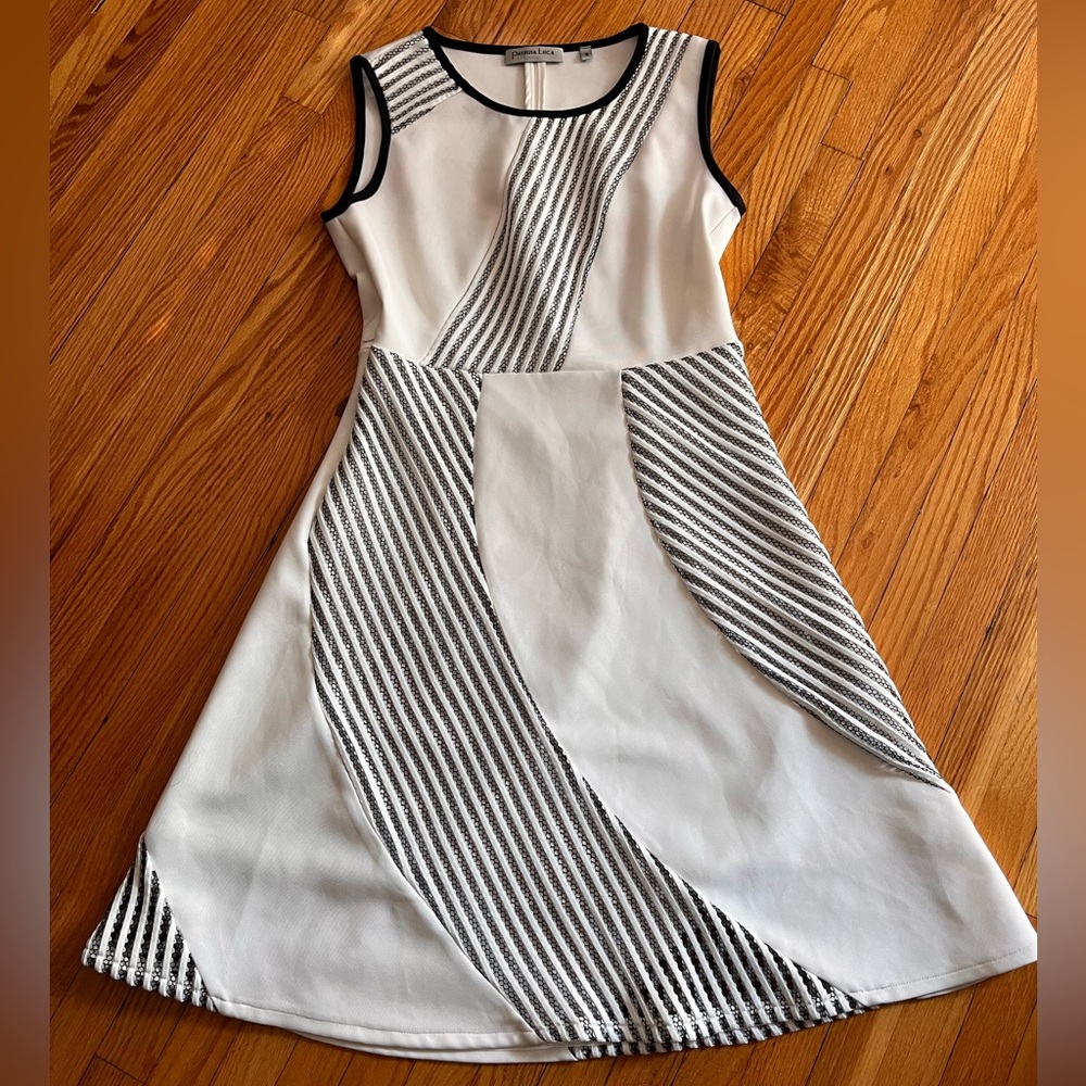 Patrizia Luca Milano White sleeveless dress.